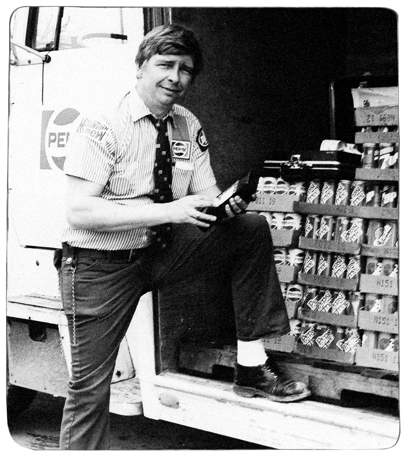 Bob Prince Posing in front of Pepsi MidAmerica Product